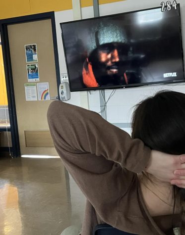 Senior Sofia Rivera watches the trailer for the Kanye trilogy. 