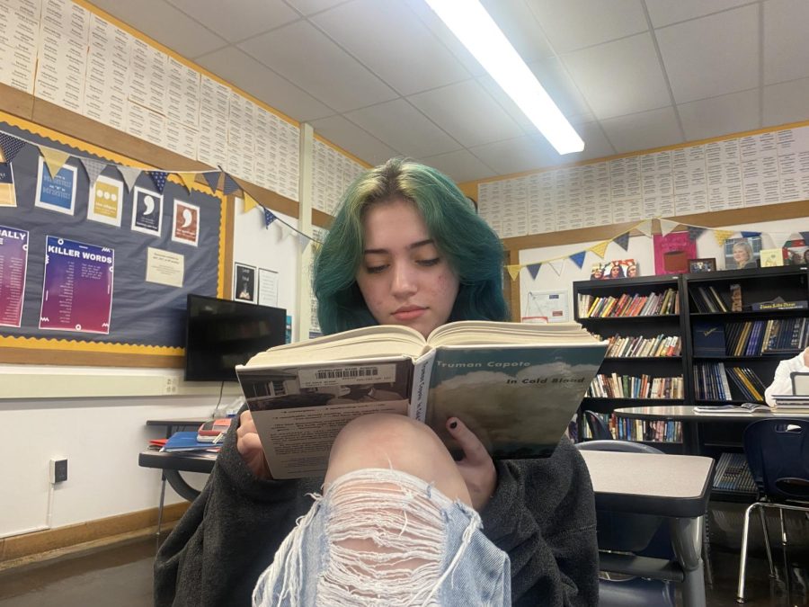 AP Language and Composition student Abby Fuller reads In Cold Blood by Truman Capote. AP Lang. students started reading In Cold Blood because it contains many rhetorical devices that are on the AP test. 