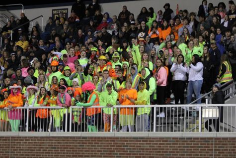 The SHS students dress up in neon colors for the football game. They waited all week to get dressed up to watch the Golden Warriors take on the Geneseo Maple Leafs