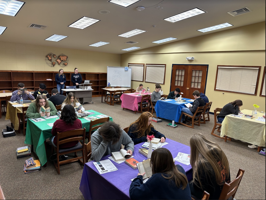 Students in AP Literature participate in the book tasting. Hosted by Mrs. Johnson, this opportunity allowed students to pick the next book for their project.