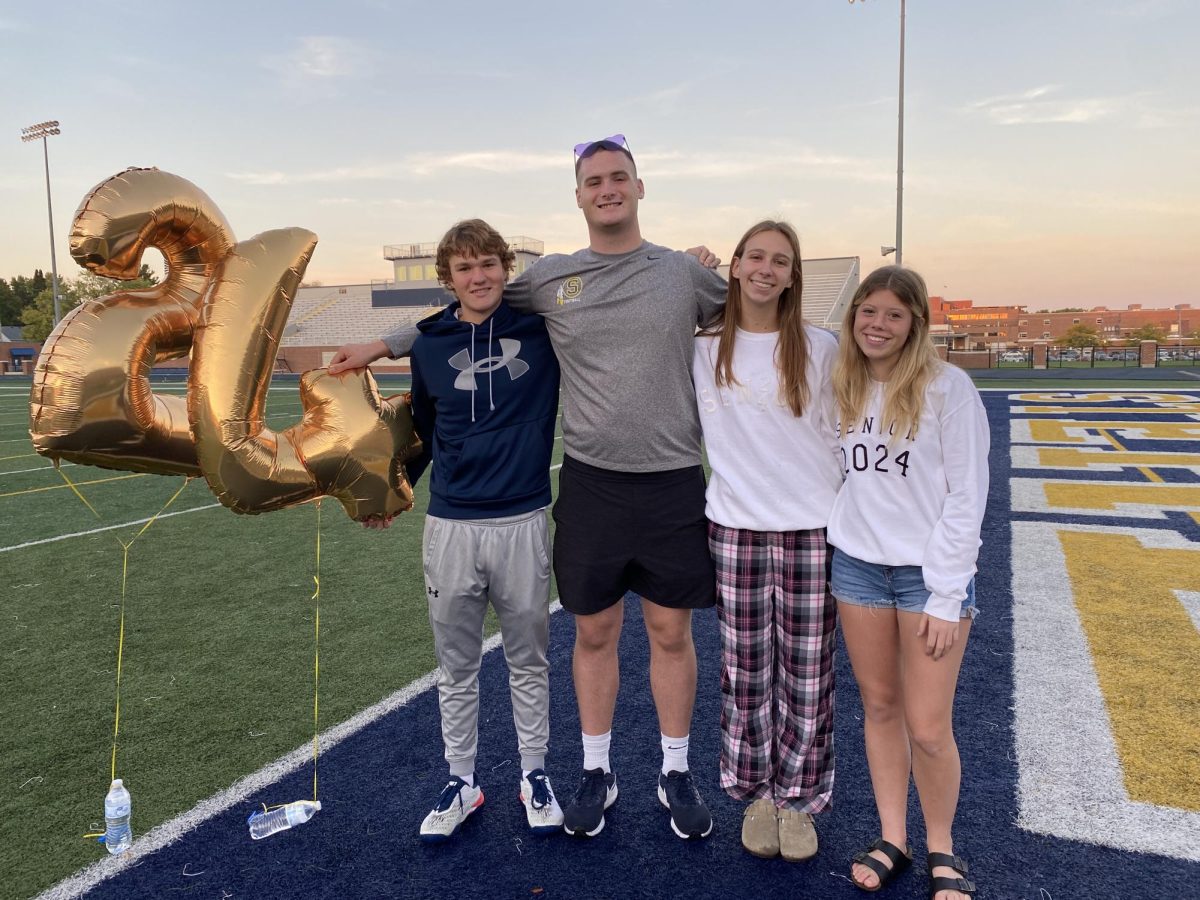 Senior class officers (l-r) Brecken Peterson, Lucas Austin, Emily Lofgren, and Lainey Block enjoy their senior sunrise. The seniors hosted one of their first events for their class.