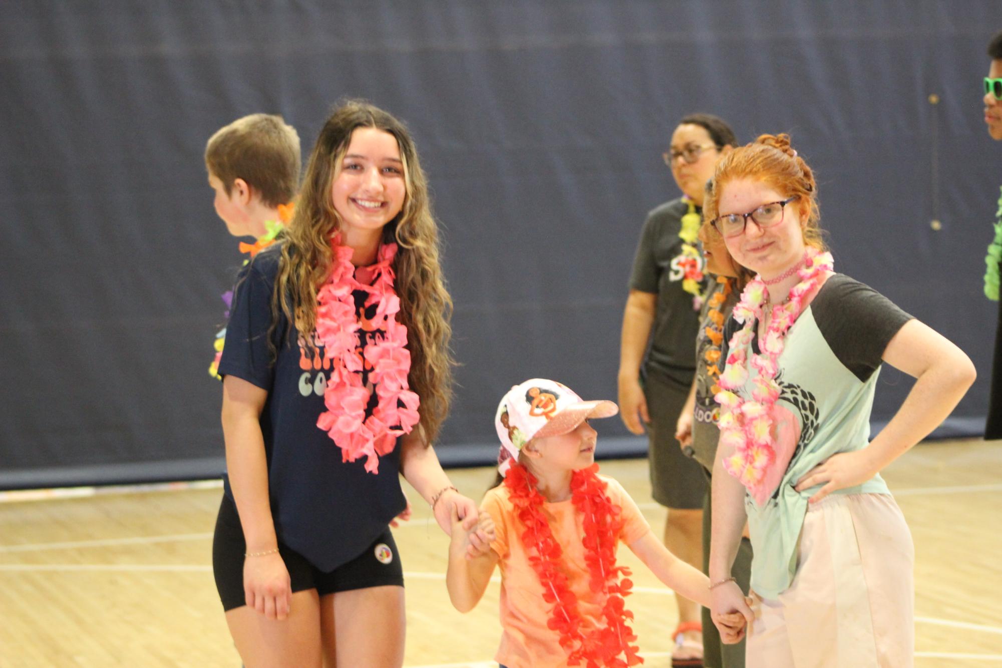 Student Councilor, Adylyn Crandall helping Life Skills students in the gym.